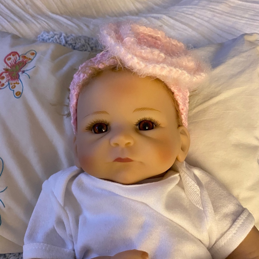 Crochet baby headband with rosette